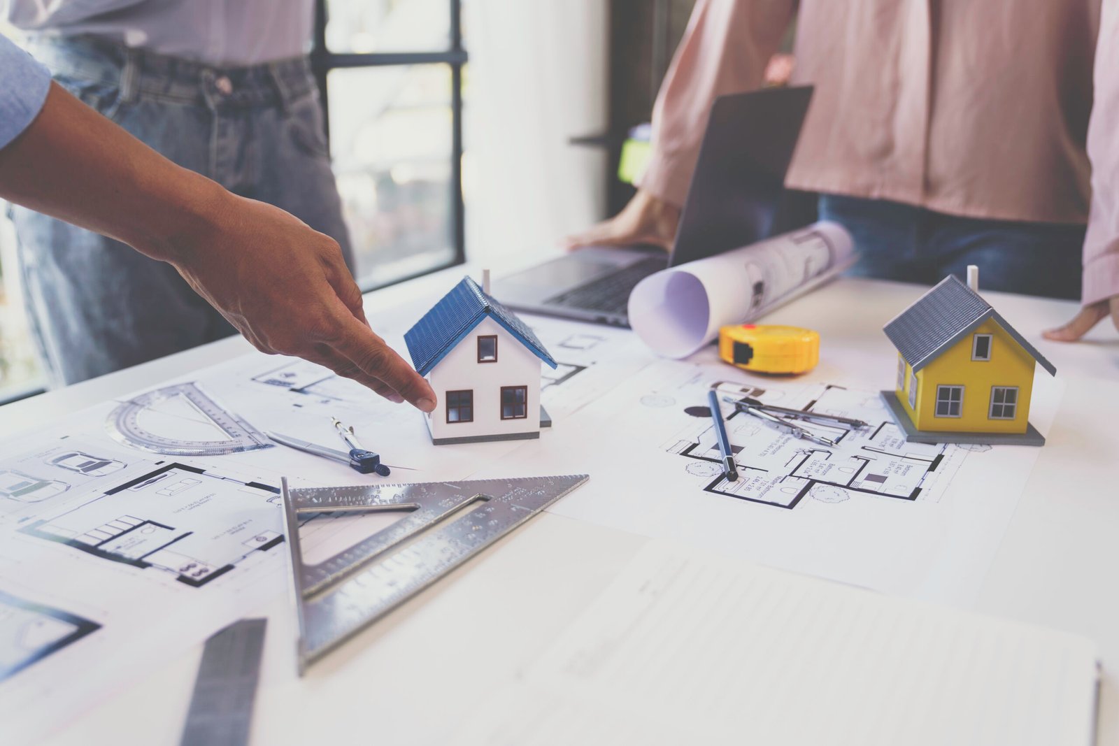 Engineer or architect meeting for project working with partner and engineering tools on model building and blueprint in working site, Construction, contract between two companies structure concept
